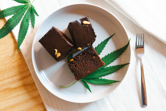 Chocolate brownies with cannabis leaves